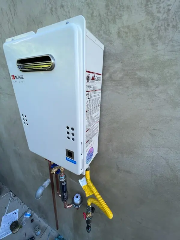 Tankless water heater installation for Caryn homes